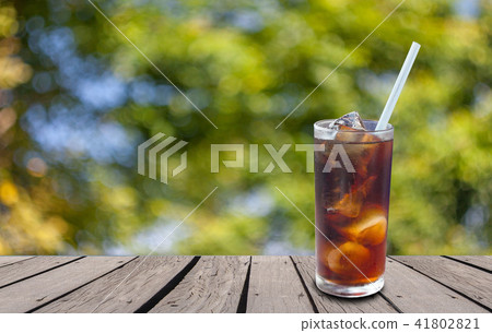 Glass of carbonated water Cola 41802821