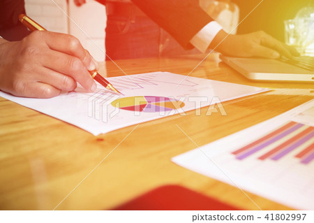 A businessman sign or discussing document or graph 41802997