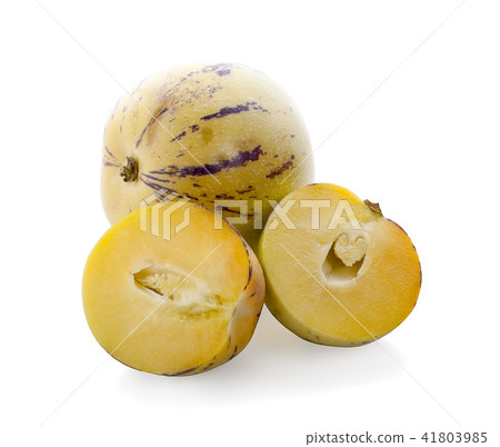 Whole and half Pepino melons on white background 41803985