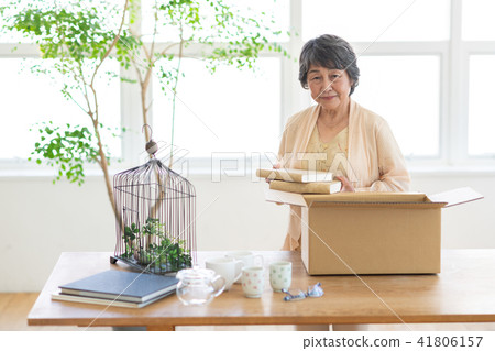 Sorting out belongings Sorting out belongings 41806157