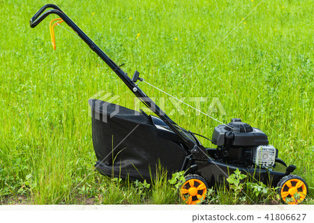 Modern gasoline powered lawn mower Modern gasoline powered lawn mower 41806627