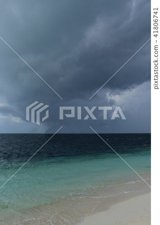 Dark hurricane cloud above tropical sea 41806741