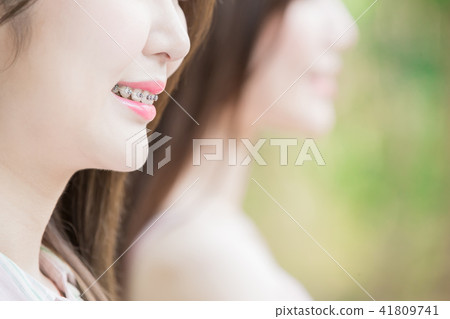 close up of woman tooth close up of woman tooth 41809741