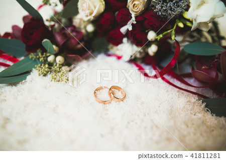 Close-up of wedding rings on beautiful background Close-up of wedding rings on beautiful background 41811281