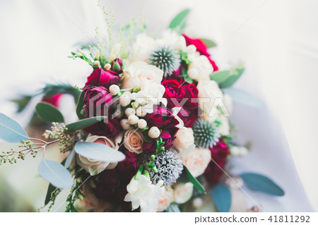 Beautiful wedding bouquet with different flowers, roses Beautiful wedding bouquet with different flowers, roses 41811292