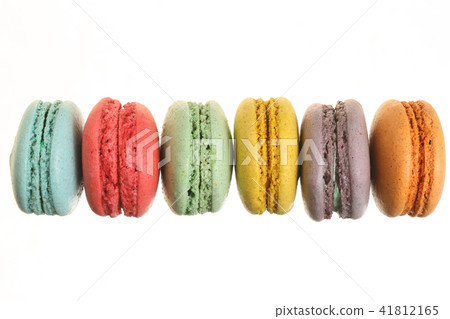 colored macaroons isolated on white background without a shadow closeup. Top view. Flat lay colored macaroons isolated on white background without a shadow closeup. Top view. Flat lay 41812165