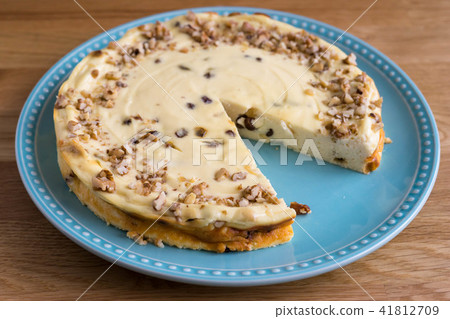 Crumble and Nut Cheesecake on a plate 41812709
