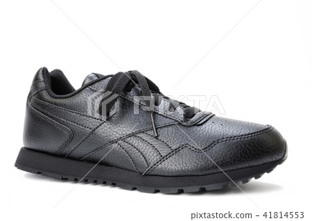 Black women's sports shoe on a white background. 41814553