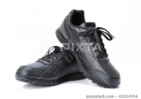 Black women's sports shoe on a white background. 41814554