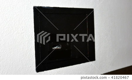 a man takes out money and a purse from the safe a man takes out money and a purse from the safe 41820467