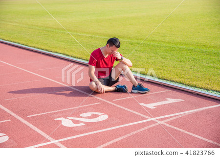 Sad asian man sitting and cry on the floor  41823766