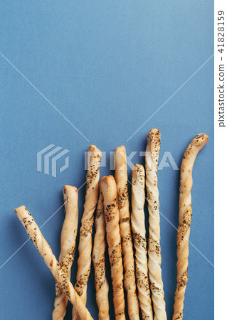 Grissini on the table. 41828159