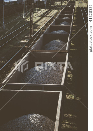 Cargo train with aggregate stones. Above view. Cargo train with aggregate stones. Above view. 41828523