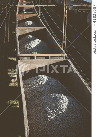 Cargo train with aggregate stones. Above view. Cargo train with aggregate stones. Above view. 41828587