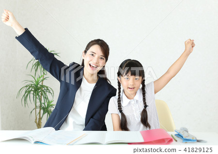 Teacher and student doing guts pose 41829125