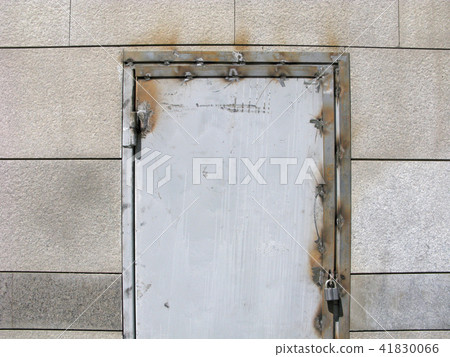 Weld seams on metal door frame, padlock on door Weld seams on metal door frame, padlock on door 41830066