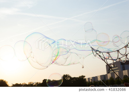 Soap bubbles above the sky 41832086