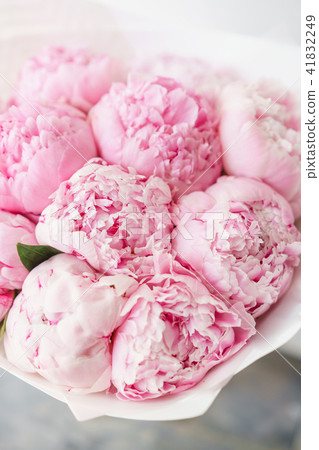 Lovely flowers in glass vase. Beautiful bouquet of pink peonies . Floral composition. Wallpaper 41832249