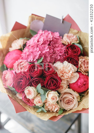 beautiful spring bouquet. flower arrangement with hydrangea and peonies. Color red and pink. The beautiful spring bouquet. flower arrangement with hydrangea and peonies. Color red and pink. The 41832250