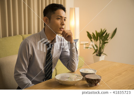 Businessman / meal after late return home 41835723
