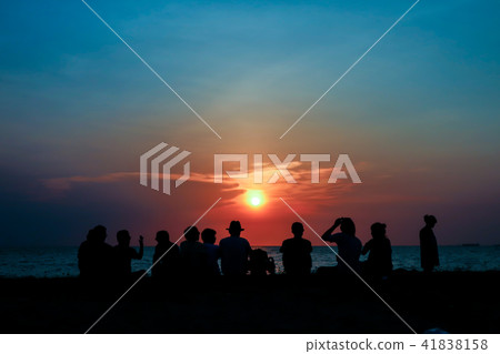 silhouette family meeting looking sunset on beach silhouette family meeting looking sunset on beach 41838158