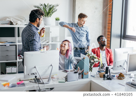 Business people at work in a busy luxury office space Business people at work in a busy luxury office space 41840105