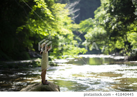 Girls playing on mountain streams 41840445