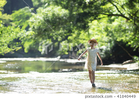 Girls playing on mountain streams 41840449