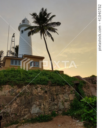 Lighthouse of fort Galle at sunset Lighthouse of fort Galle at sunset 41840782