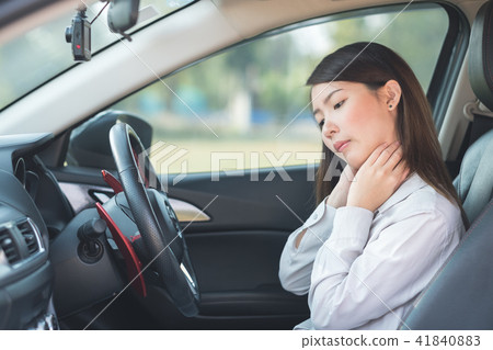 Asian woman pained her neck after driving Asian woman pained her neck after driving 41840883