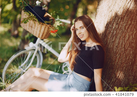Girl with a bike Girl with a bike 41841079
