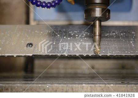 The CNC milling machine cutting the tire mold The CNC milling machine cutting the tire mold 41841928