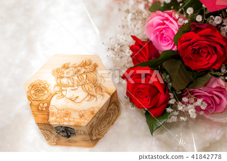 Wood burning and bouquets 41842778