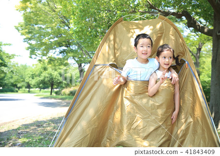 Children playing with tents 41843409