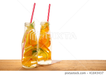 couple of bottles lemonade with lemon, orange couple of bottles lemonade with lemon, orange 41843437