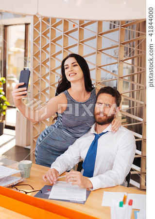 Amorous woman flirting with her boss 41844000