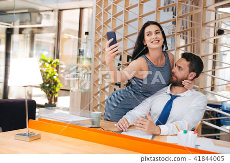 Passionate woman flirting with her boss Passionate woman flirting with her boss 41844005