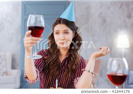 Young businesswoman attending birthday party of her niece 41844176