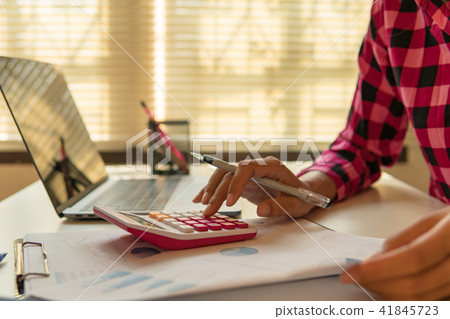 Business man calculate about cost  41845723