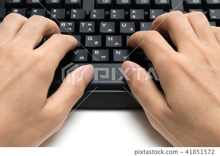 Hand with computer keyboard 41851572