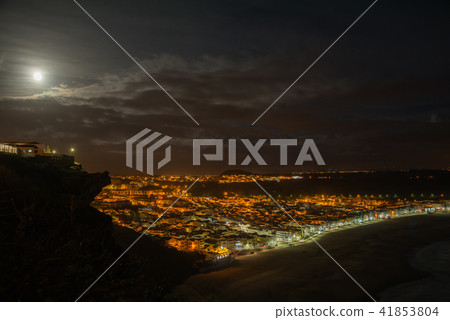 Portugal Nazare night scene, night view of Nazarene, Portugal, full moon Portugal Nazare night scene, night view of Nazarene, Portugal, full moon 41853804