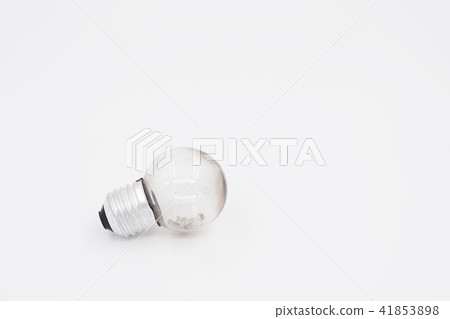 Burned light bulb on white background Burned light bulb on white background 41853898
