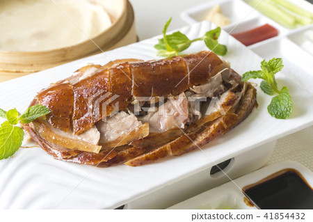 Enjoying roasted Peking duck 41854432