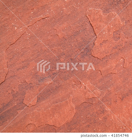 Red rough stone texture background. Red rough stone texture background. 41854746