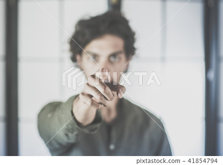 Close Up of Young Man With Hands at Head in Fear 41854794