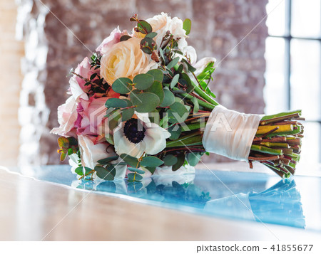Bridal bouquet with roses, anemone and ranunculus Bridal bouquet with roses, anemone and ranunculus 41855677
