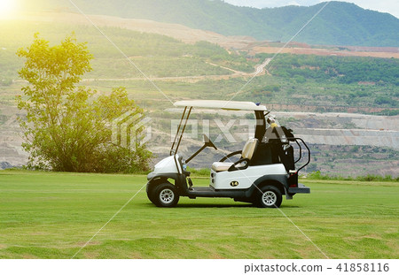 Golf carts on a golf course 41858116