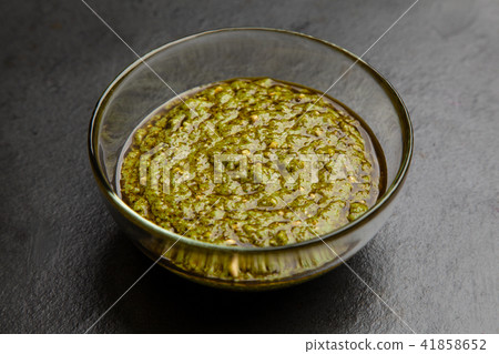 Pesto sauce in a bowl Pesto sauce in a bowl 41858652