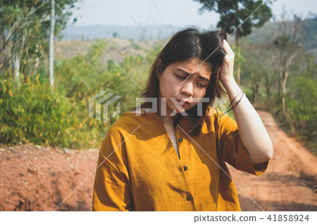 Young Asian woman feeling worry and sad. 41858924