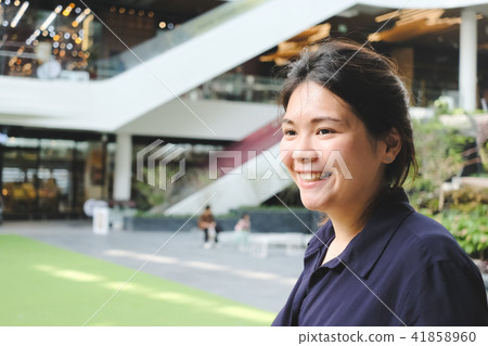 Close up of Asian woman smiling. Close up of Asian woman smiling. 41858960